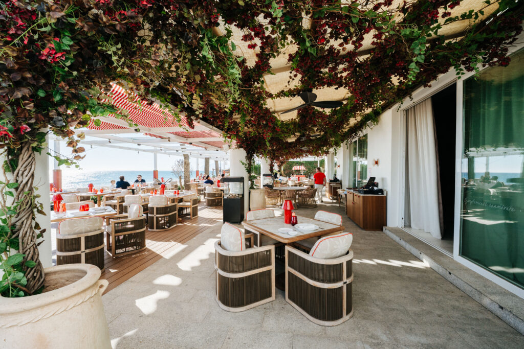 restaurant in a beach club by a hotel