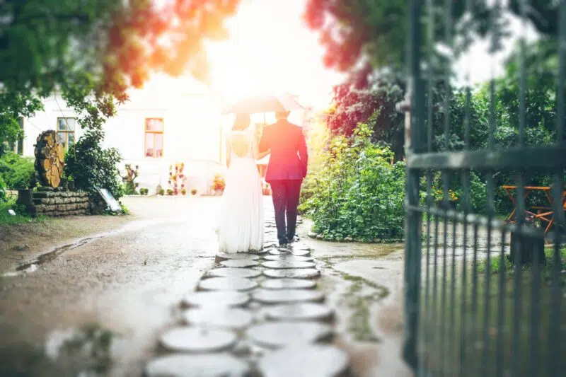 newly wedded couple walking