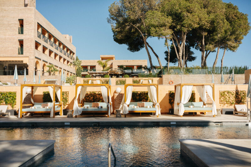 pool and cabanas in a hotel